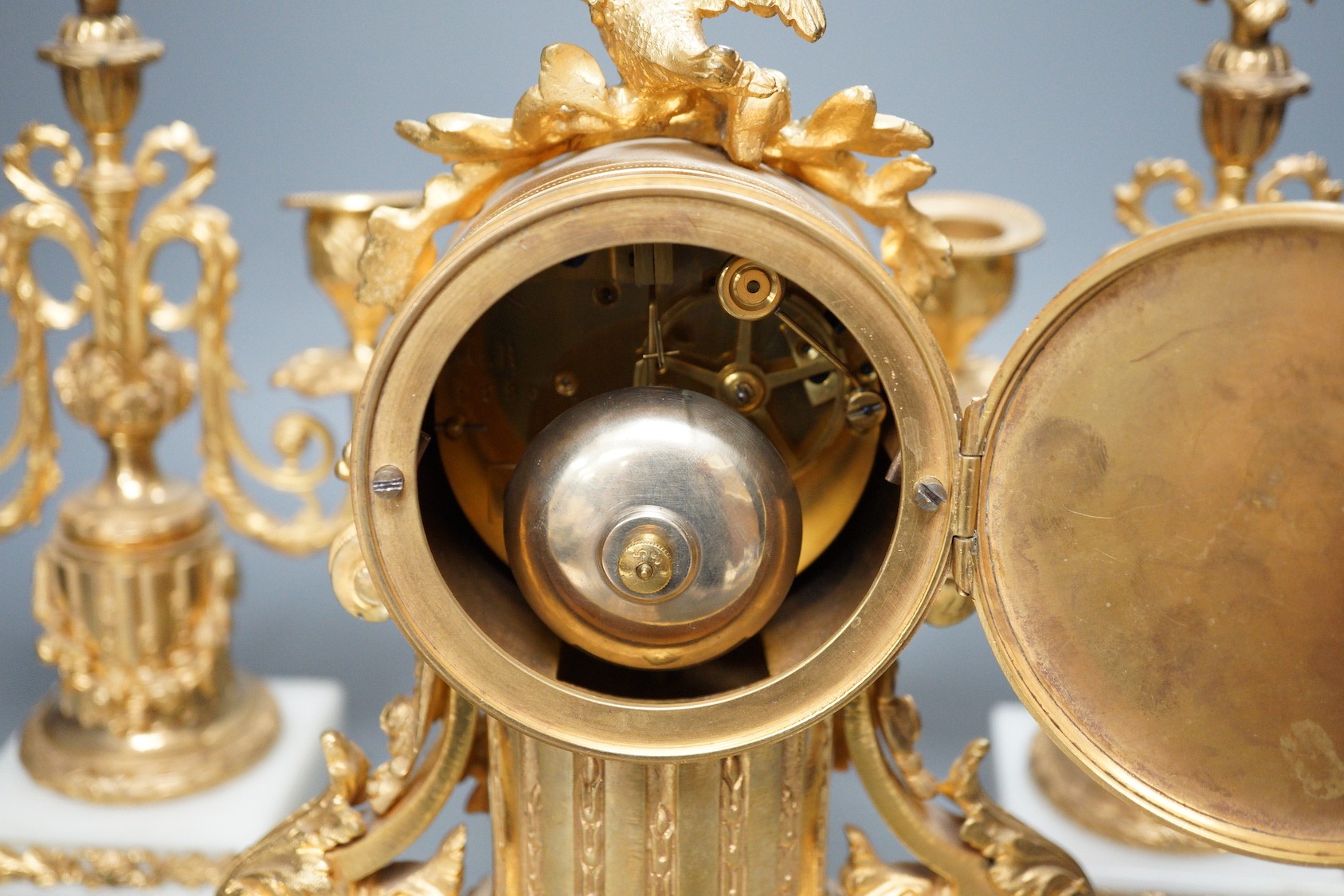 A French ormolu and alabaster clock garniture, 27cm